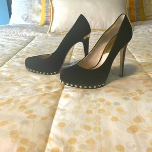 A beautiful black with gold accents Michael Kors shoes